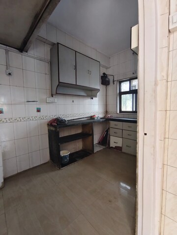 Kitchen in 1 BHK Apartment at Deepanjali CHS, Malad West – for Rent