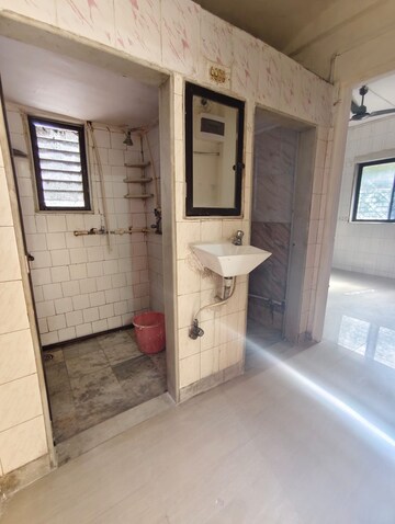 Bathroom in 1 BHK Apartment at Deepanjali CHS, Malad West – for Rent