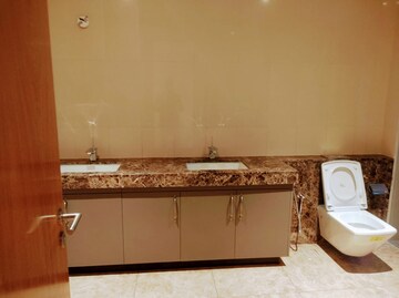 Bathroom in 3 BHK Apartment at Embassy Lake Terrace, Hebbal – for Rent