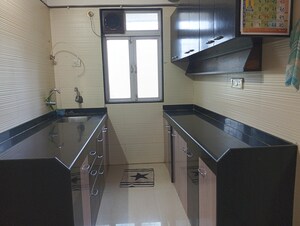 Kitchen in 2 BHK Apartment at Cosmos Classique, Ghodbunder Road – for Sale
