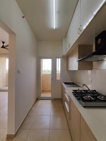 Kitchen in 2 BHK Apartment at Bhartiya Nikoo Homes, Thanisandra Main Road – for Rent