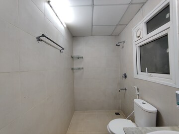 Bathroom in 2 BHK Apartment at Bhartiya Nikoo Homes, Thanisandra Main Road – for Rent