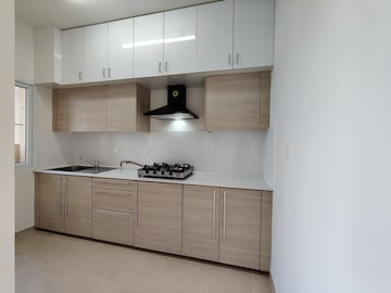 Kitchen in 2 BHK Apartment at Bhartiya Nikoo Homes, Thanisandra Main Road – for Rent