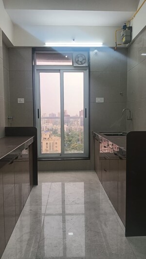 Kitchen in 2 BHK Apartment at Amar Om Vasudev CHS, Borivali West – for Sale