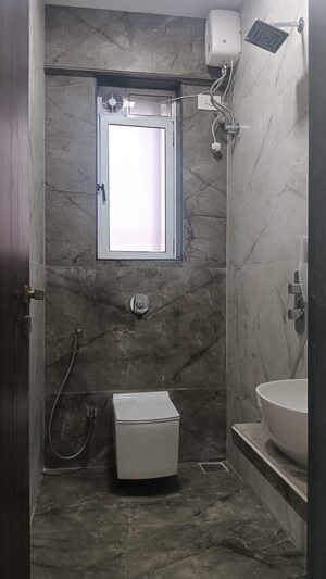 Bathroom in 2 BHK Apartment at Amar Om Vasudev CHS, Borivali West – for Sale