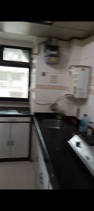 Kitchen in 1 BHK Apartment at Avillion Greenfields Co Op Housing Society, Jogeshwari East – for Rent
