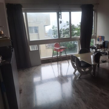 Living Room in 4 BHK Apartment at Samrat Gilt Residences, Uday Baug – for Sale