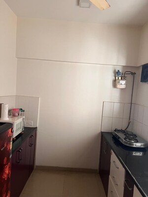 Kitchen in 2 BHK Apartment at Ashok Medows, Hinjewadi – for Rent