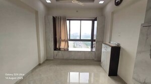 Living Room in 1 BHK Apartment at Nakul Raj , Malad West – for Sale