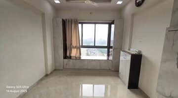 Living Room in 1 BHK Apartment at Nakul Raj , Malad West – for Sale
