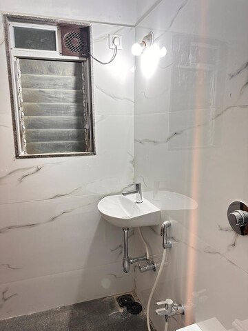 Bathroom in 2 BHK Apartment at DGS Sheetal Usha, Malad West – for Rent