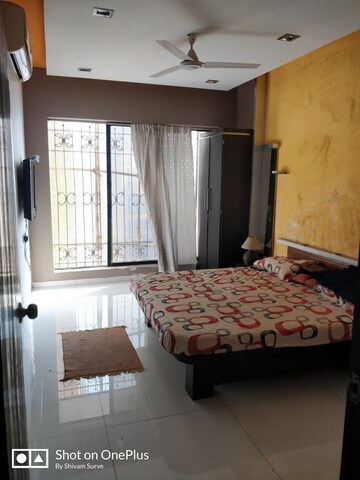 Bedroom in 2 BHK Apartment at Windermere CHS Andheri West, Andheri West – for Rent
