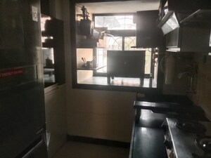 Kitchen in 1 BHK Apartment at Brightland Phase 1 CHS, Balkum Pada – for Rent