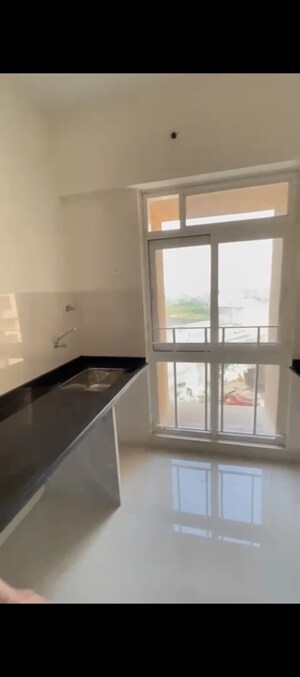 Kitchen in 1 BHK Apartment at Vijay Orovia, Ghodbunder Road – for Sale