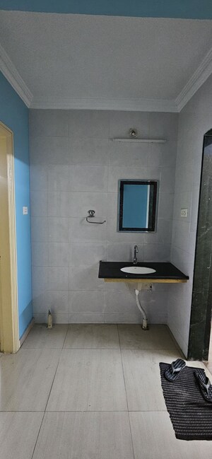 Bathroom in 3 BHK Apartment at GK Dwarka Sai Paradise, Pimple Saudagar – for Rent