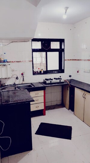 Kitchen in 1 BHK Apartment at Humjoli Apartment, Santacruz West – for Rent