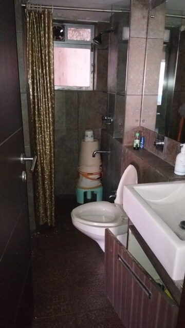 Bathroom in 2 BHK Apartment at Indra Darshan Apartment, Andheri West – for Rent
