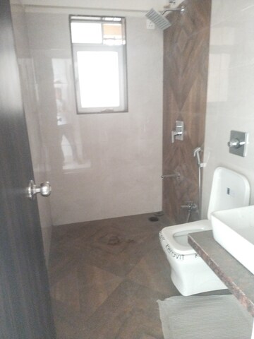 Bathroom in 3 BHK Apartment at Hubtown Greenwoods, Vartak Nagar – for Sale