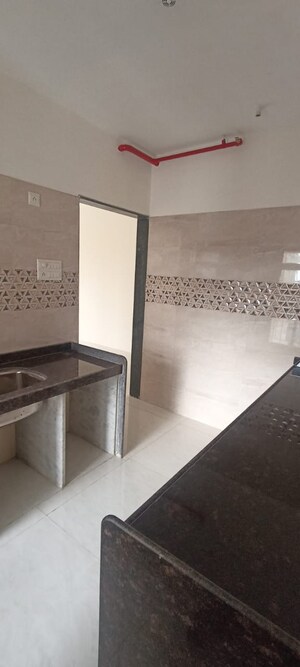 Kitchen in 2 BHK Apartment at Rashi Tower, Goregaon East – for Sale