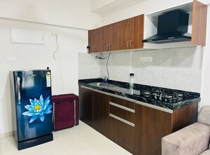 Kitchen in Studio Apartment at Gera World of Joy, Kharadi – for Rent