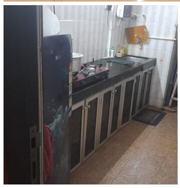 Kitchen in 2 BHK Apartment at Kuber Complex, Andheri West – for Sale
