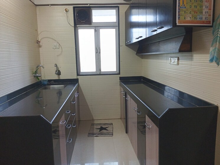 Kitchen, cosmos-classique 2 Bedroom 638 Sq.Ft. Apartment In Ghodbunder Road Thane 9207234