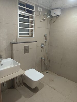 Bathroom in 3 BHK Apartment at Gulmohar Road – for Rent