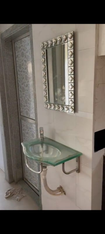 Bathroom in 2 BHK Apartment at Roshan CHS Andheri, Andheri East – for Sale