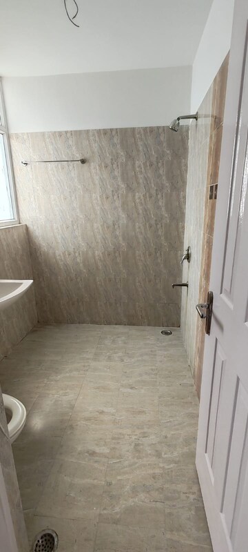 Bathroom in 3 BHK Apartment at Amrapali Heartbeat City, Sector 107 – for Sale