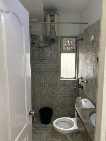 Bathroom in 3 BHK Apartment at Amrapali Heartbeat City, Sector 107 – for Sale