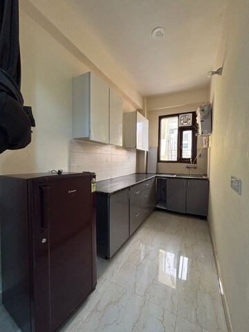 Kitchen in 2 BHK Apartment at Palm Residency Chhatarpur, Chattarpur – for Rent