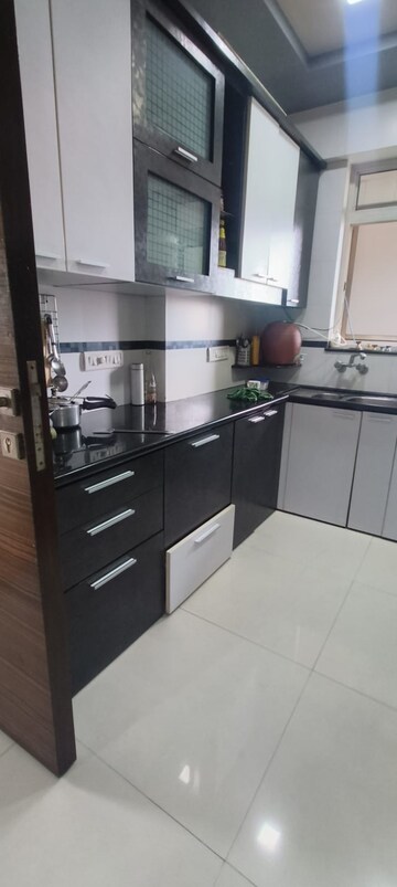 Kitchen in 3 BHK Apartment at Hiranandani Meadows, Manpada – for Sale