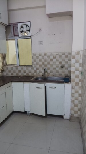 Kitchen in 2 BHK Apartment at Gaur City 5th Avenue, Sector 4 Greater Noida – for Rent