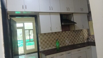 Kitchen in 2 BHK Apartment at Gaur City 5th Avenue, Sector 4 Greater Noida – for Rent