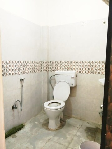 Bathroom in 4 BHK Apartment at Chattarpur – for Sale