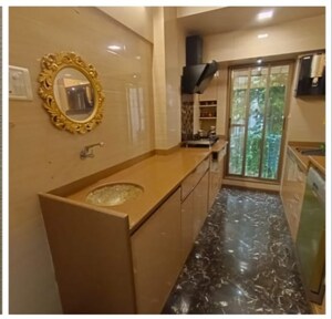 Kitchen in 3 BHK Apartment at Andheri Panchvati CHS, Andheri West – for Sale