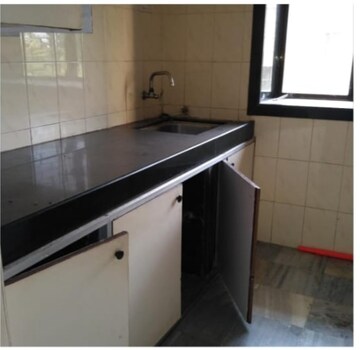 Kitchen in 2.5 BHK Apartment at Seven Bungalow, Andheri West – for Rent