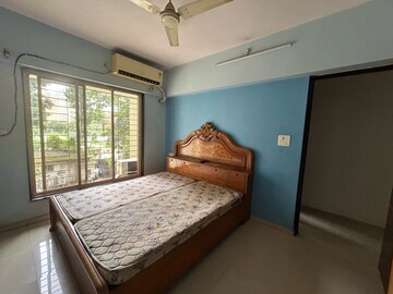 Bedroom in 2 BHK Apartment at VR Bhoomi Acres G Wing, Hiranandani Estate – for Rent