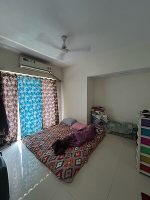 Living Room in 1 BHK Apartment at Metropolis Rivera, Koliwada – for Rent