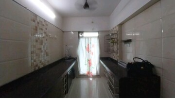 Kitchen in 2 BHK Apartment at Runwal Garden City, Balkum Pada – for Sale