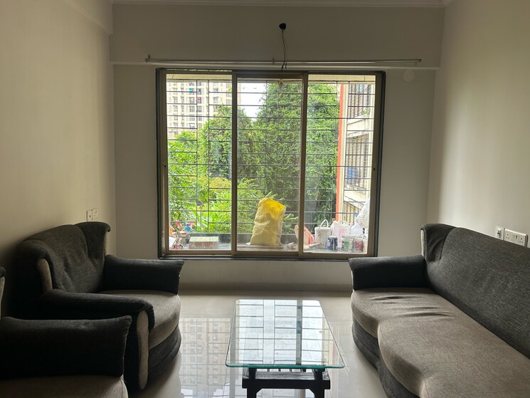 Living Room, unique-greens-ghodbunder-road 2 Bedroom 628 Sq.Ft. Apartment In Parkwoods Thane 9207928