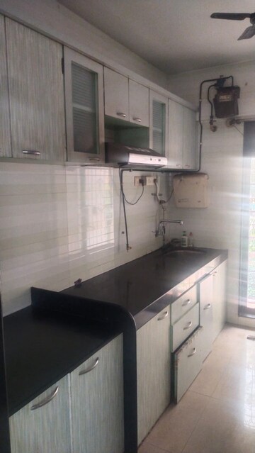 Kitchen in 2 BHK Apartment at Kopar Khairane Sector 14 – for Rent