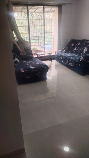 Living Room in 2 BHK Apartment at Kopar Khairane Sector 14 – for Rent