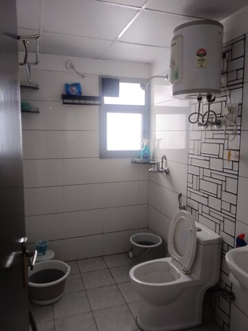 Bathroom in 3 BHK Apartment at Gulshan Bellina, Sector 16 Greater Noida – for Rent
