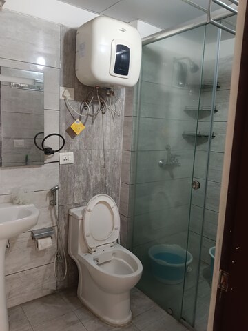Bathroom in 3 BHK Apartment at Gulshan Bellina, Sector 16 Greater Noida – for Rent