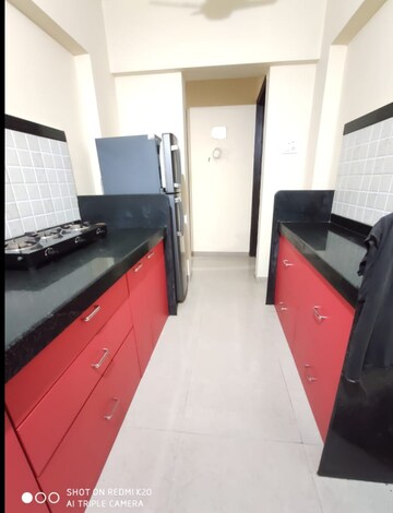 Kitchen in 2 BHK Apartment at Damji Shamji Mahavir Kalpavruksha Wing J Phase 2, Thane West – for Sale