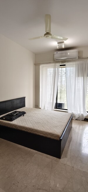 Bedroom in 2 BHK Apartment at Windermere CHS Andheri West, Andheri West – for Rent
