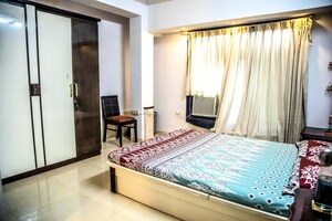 Bedroom in 2 BHK Apartment at Status CHS, Andheri West – for Rent