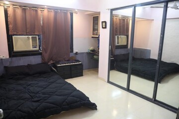 Living Room in 2 BHK Apartment at Status CHS, Andheri West – for Rent