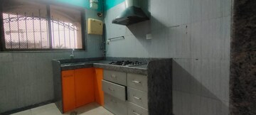 Kitchen in 2 BHK Apartment at Tharwani Heights, Sanpada – for Rent